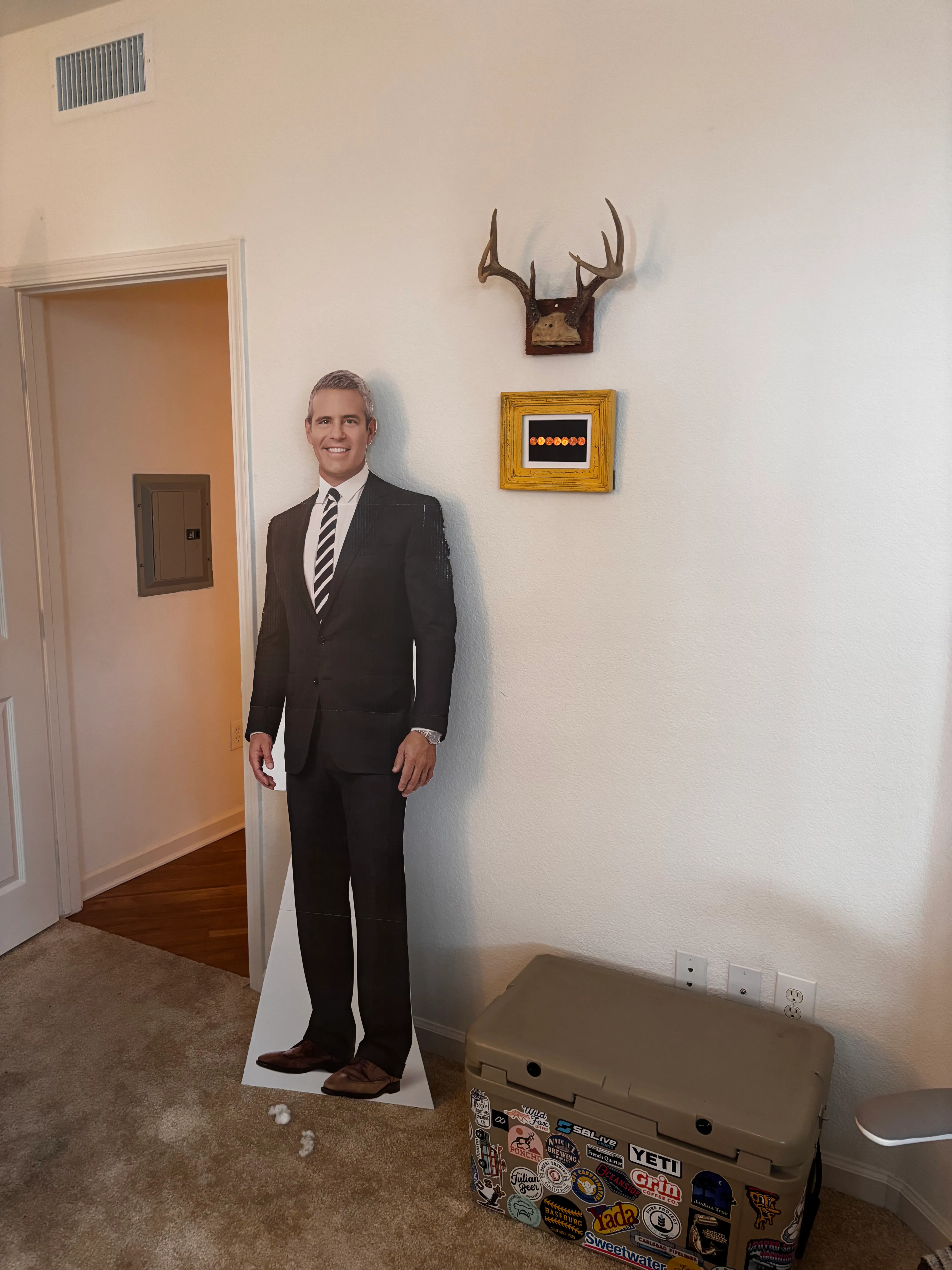 A life-size cut-out of Andy Cohen