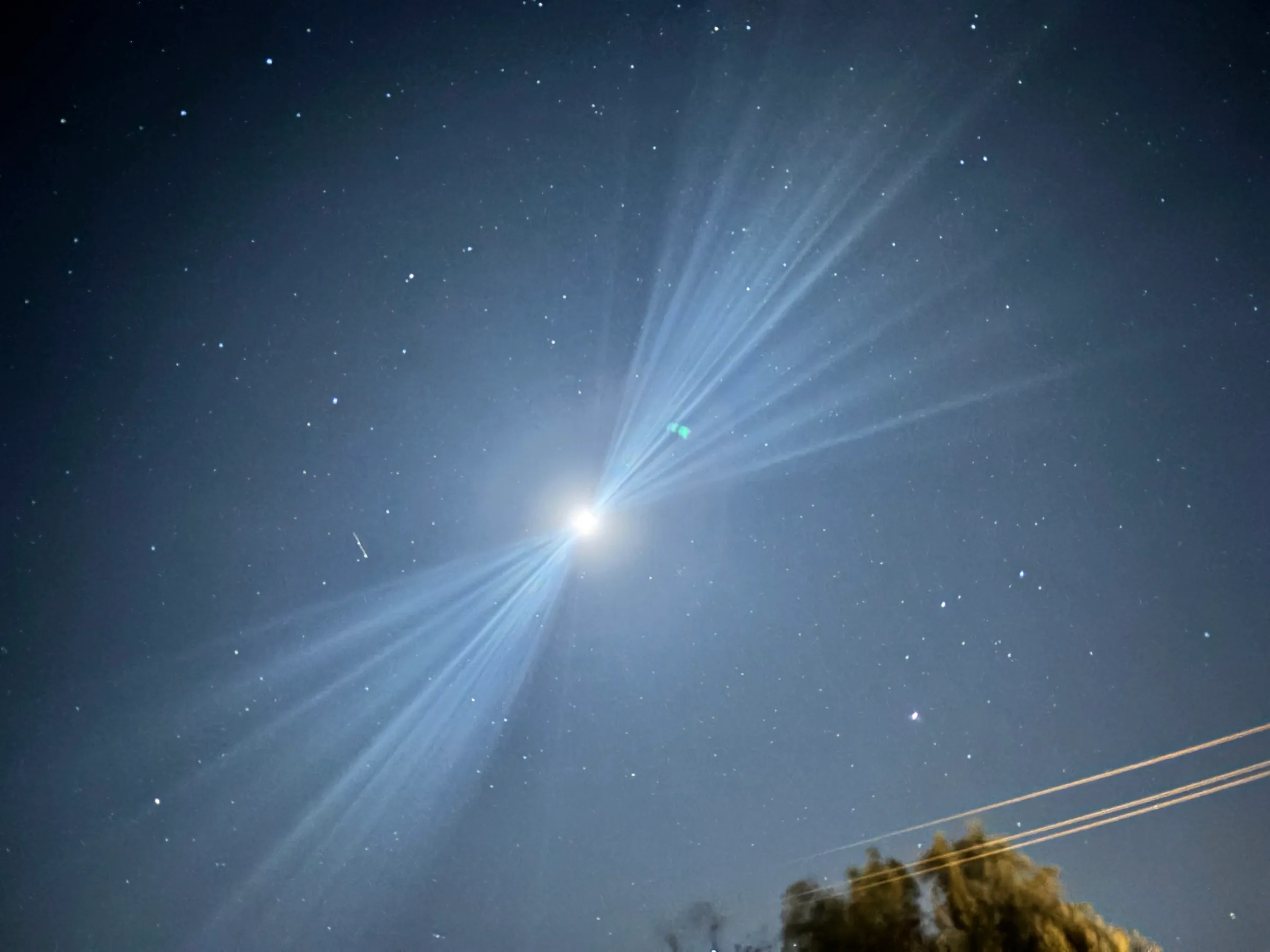 A long exposure of the moon in the night sky